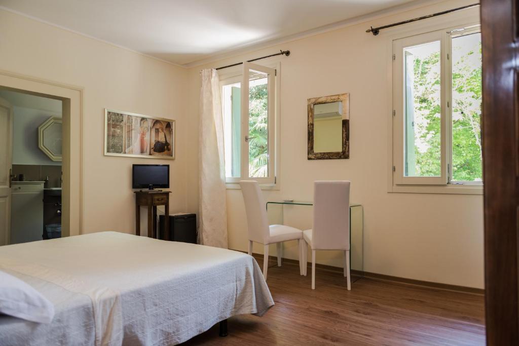 TV a/nebo společenská místnost v ubytování Ca' Settecento "Villa Cavazza Querini"