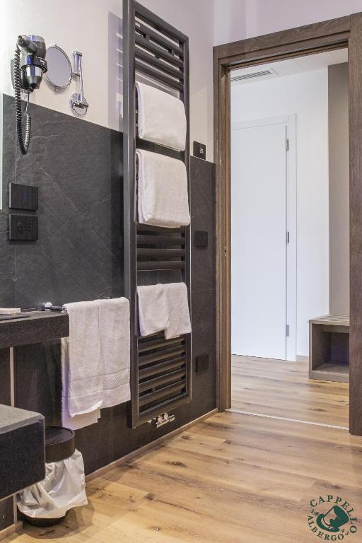 Voodi või voodid majutusasutuse Albergo Cappello e Cadore toas