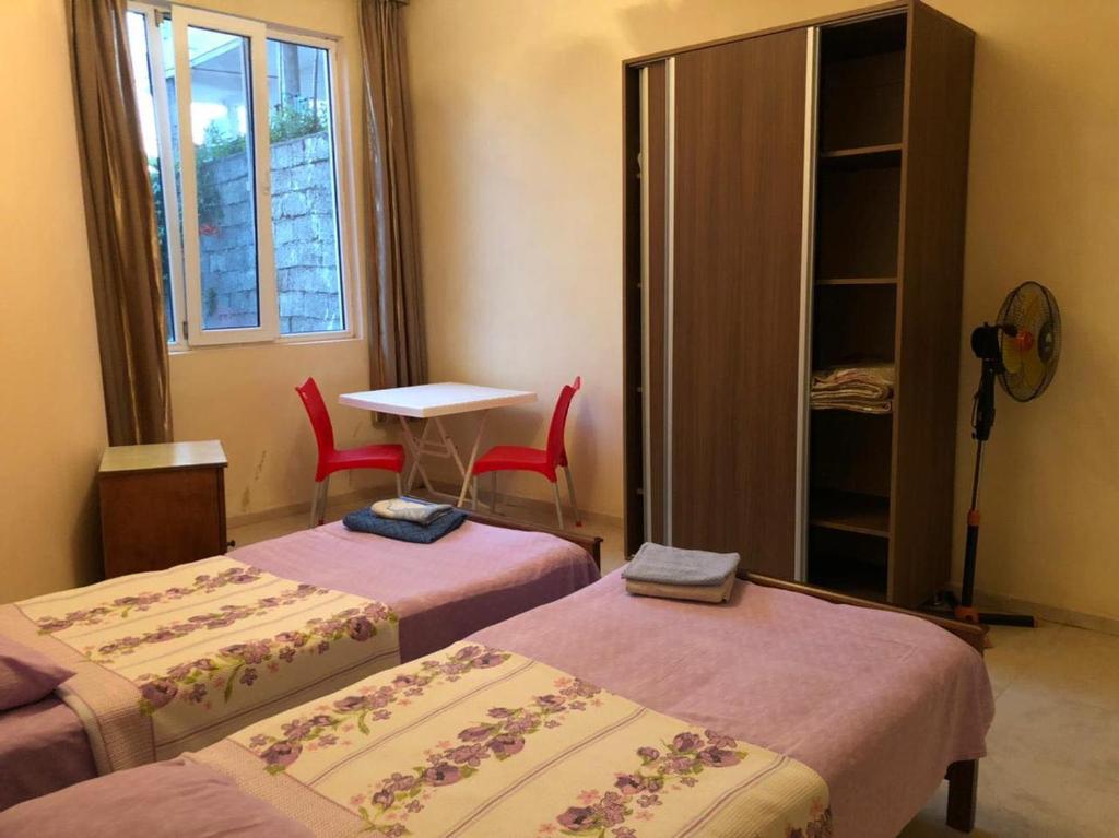 Postel nebo postele na pokoji v ubytování Sanni Guest House