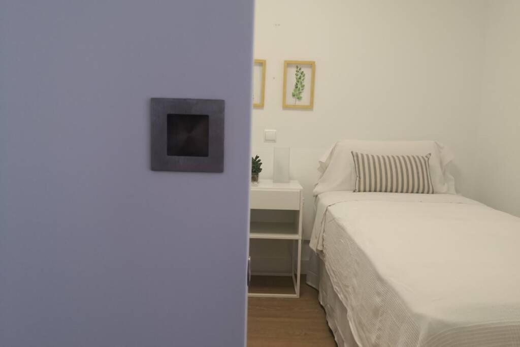 Postel nebo postele na pokoji v ubytování El apartamento de Irma