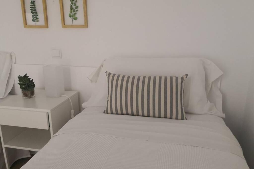 Postel nebo postele na pokoji v ubytování El apartamento de Irma