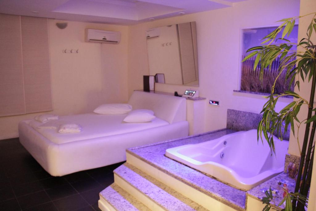 Postel nebo postele na pokoji v ubytování Motel KamaSutra