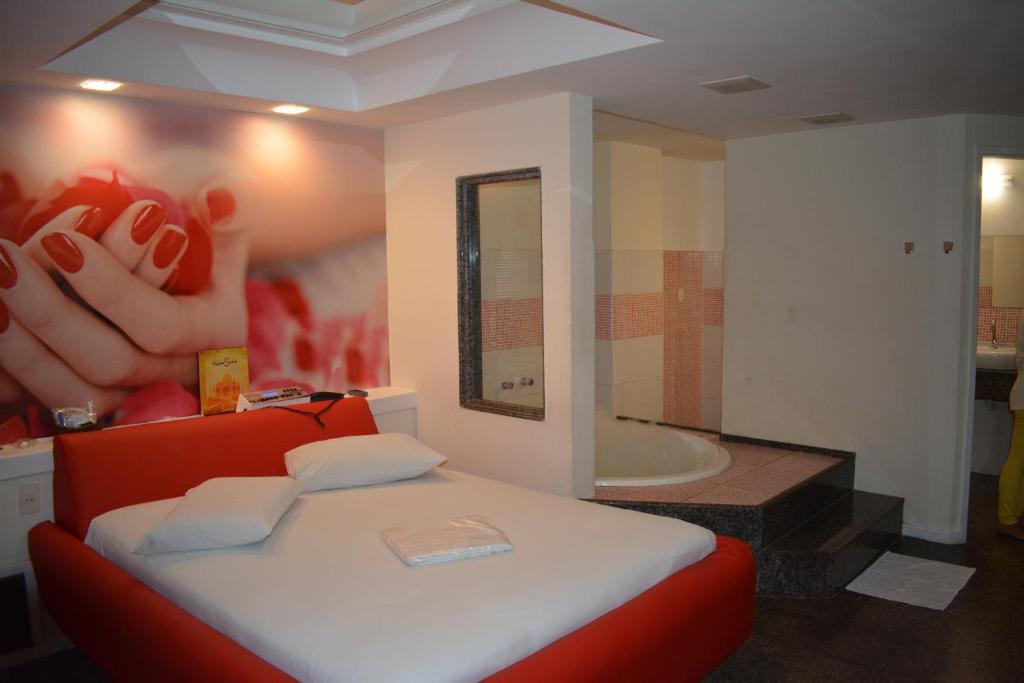 Postel nebo postele na pokoji v ubytování Motel KamaSutra