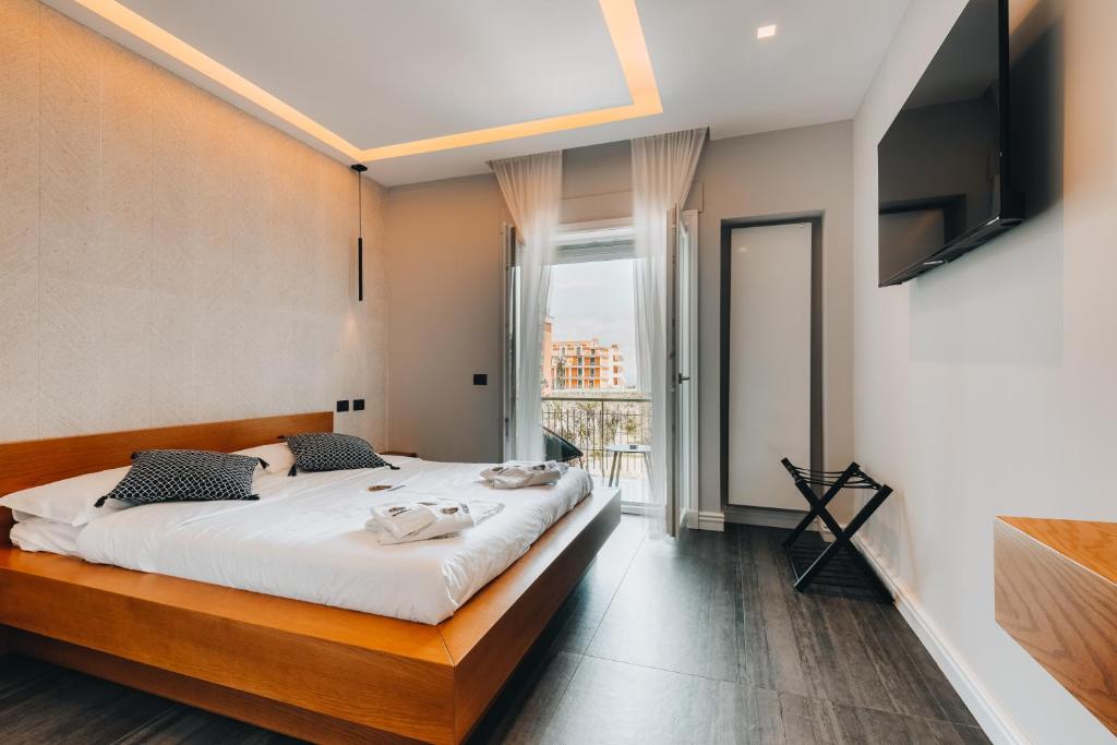 Postel nebo postele na pokoji v ubytování Sama Apartments Sorrento
