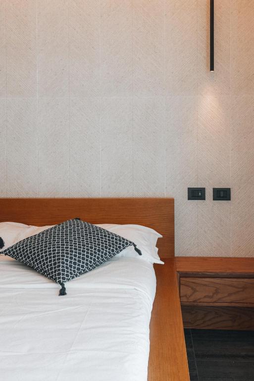 Postel nebo postele na pokoji v ubytování Sama Apartments Sorrento