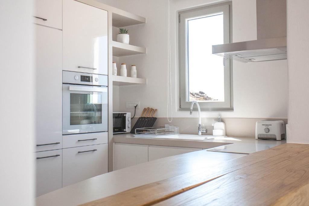 Kuchyň nebo kuchyňský kout v ubytování Bellevue Villas