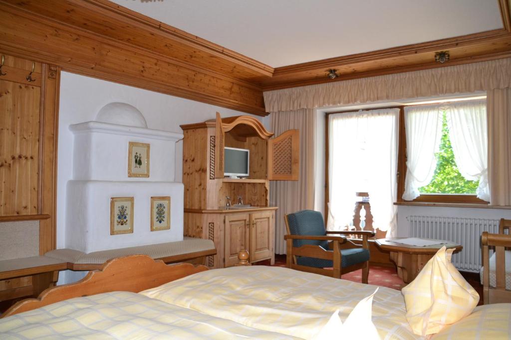 Postel nebo postele na pokoji v ubytování Hotel Gasthof Adler
