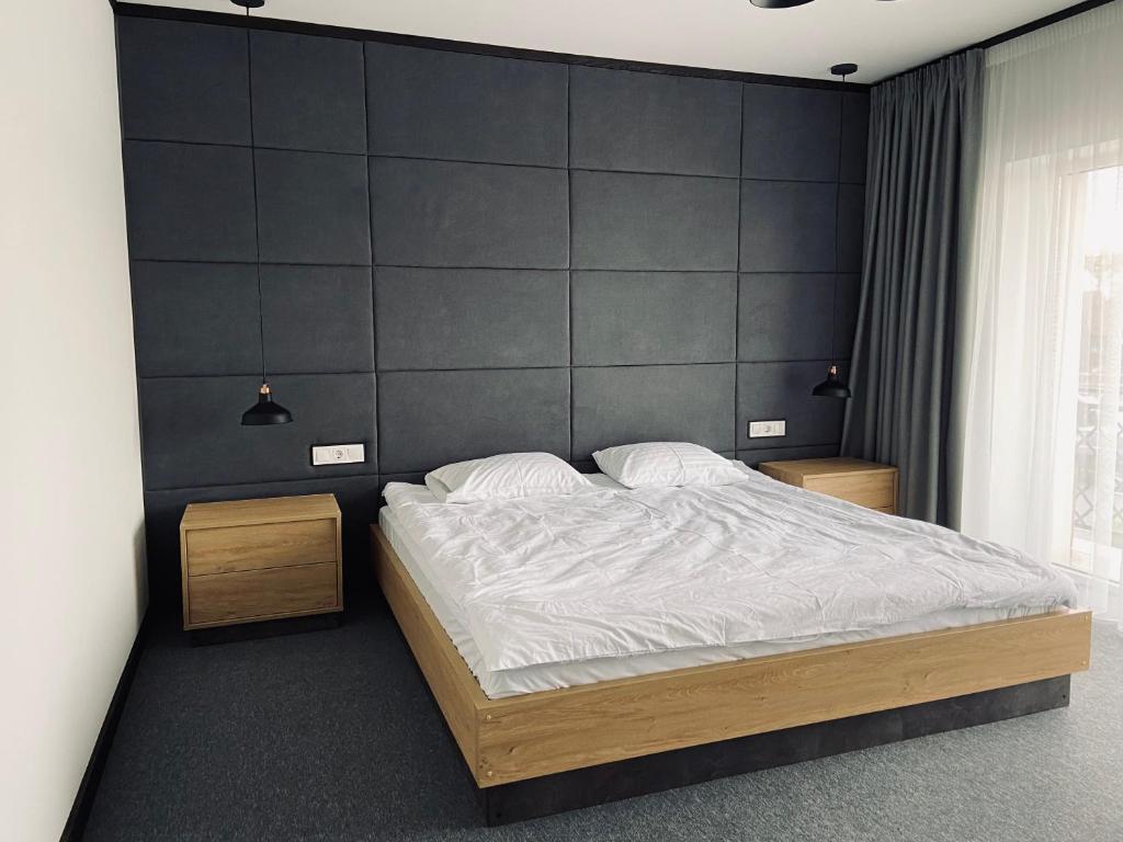 Giường trong phòng chung tại Hotel Terrazzo