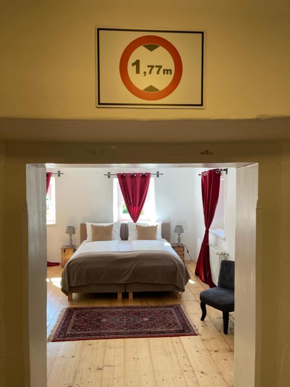 Una cama o camas en una habitación de Fenix Hall Boutique Hotel Hallstatt