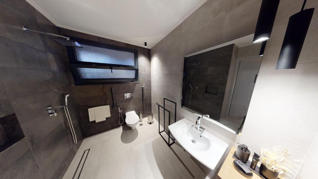 Kúpeľňa v ubytovaní DAELIA Villas