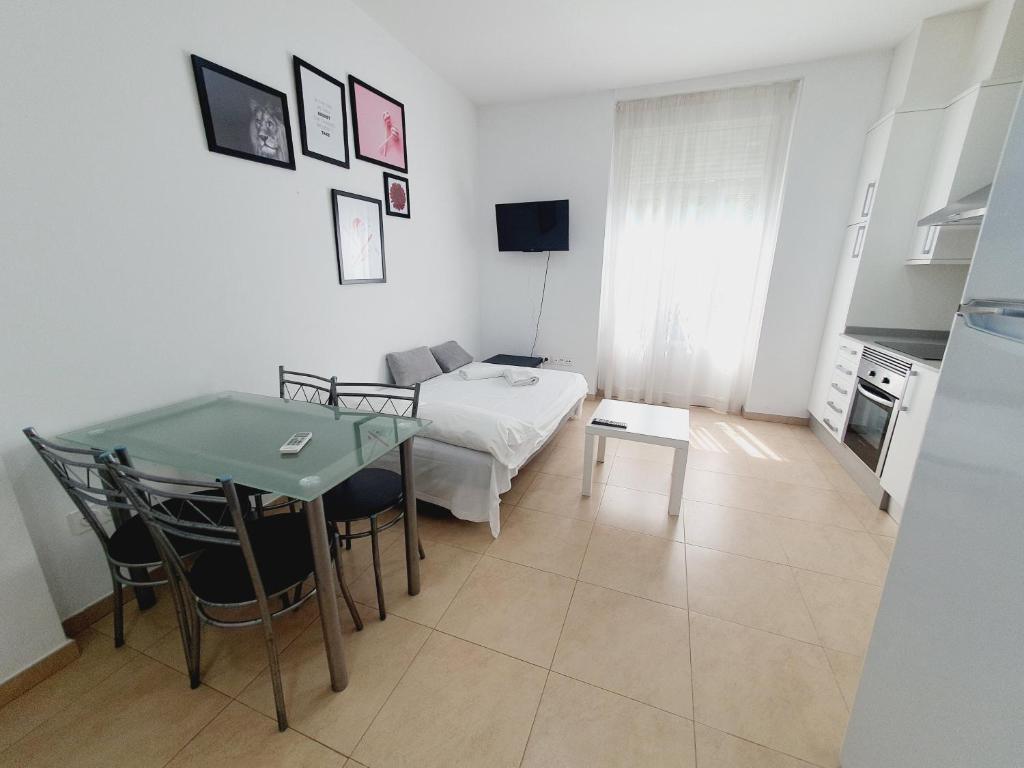 A kitchen or kitchenette at Luxury Apartments Puerto Valencia