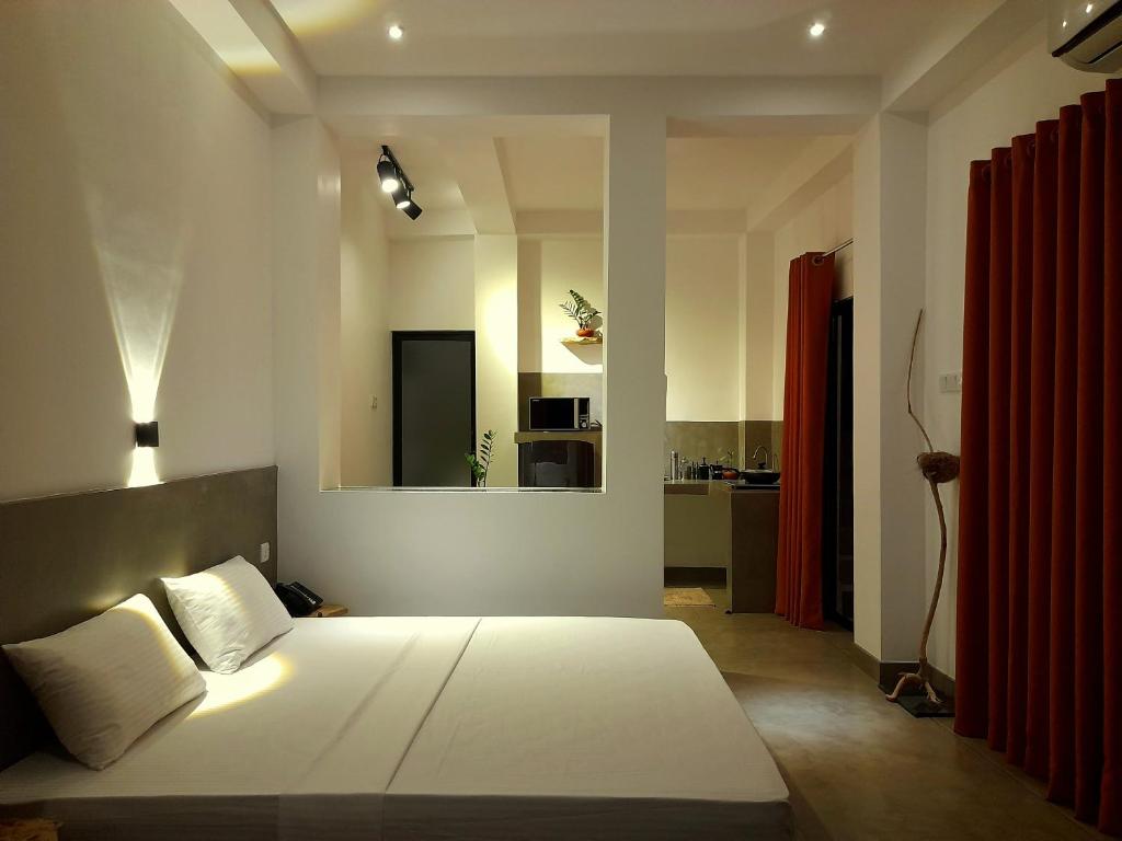 Postel nebo postele na pokoji v ubytování Weligama Bay Watsila Resort