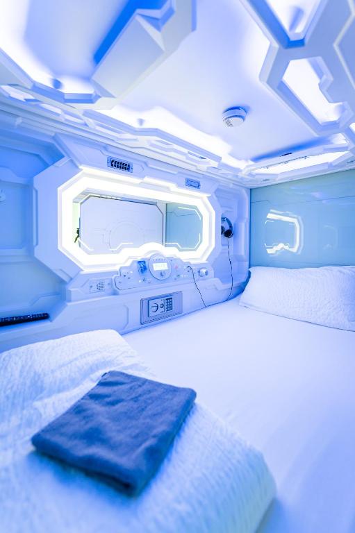 Postel nebo postele na pokoji v ubytování Space Home Apartment - City Center