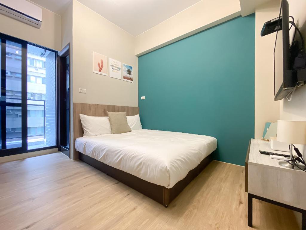 想想旅居 Allegro Hostel客房内的一张或多张床位