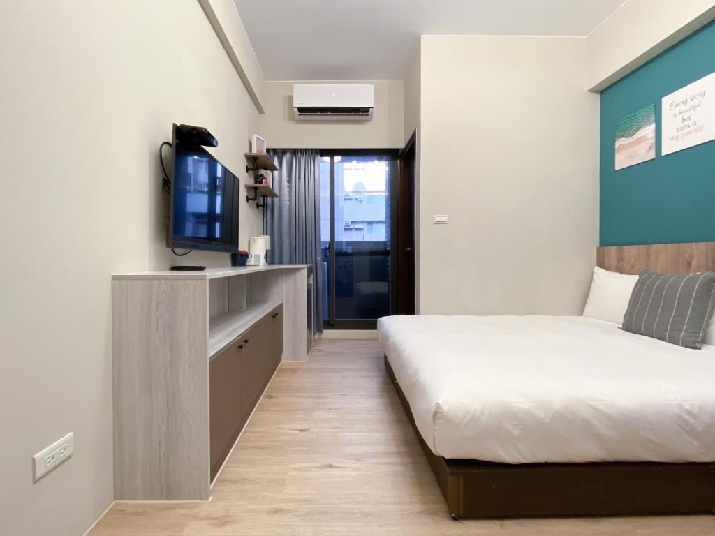 想想旅居 Allegro Hostel客房内的一张或多张床位