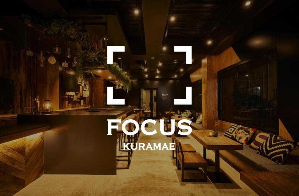 a magazine with the words foscus the koreanarma written on a room at Focus Kuramae in Tokyo