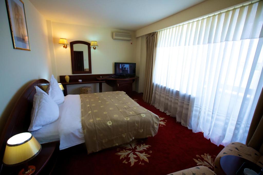 TV a/nebo společenská místnost v ubytování Hotel Delta 3