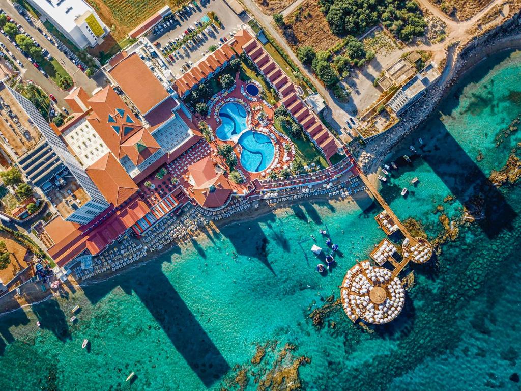 an aerial view of the water at a resort at Salamis Bay Conti Hotel Resort & SPA & Casino in Famagusta