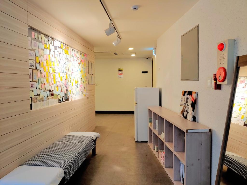 Postel nebo postele na pokoji v ubytování Dongseongro ZERO guesthouse