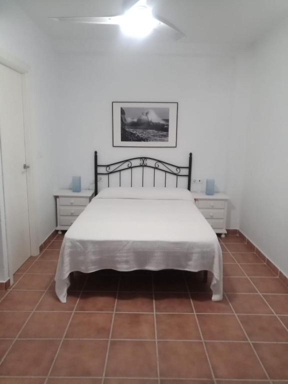 A bed or beds in a room at ALCARAVAN 50