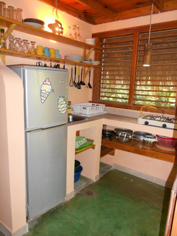 Cucina o angolo cottura di Casa 3 amigos-Palm roofed house