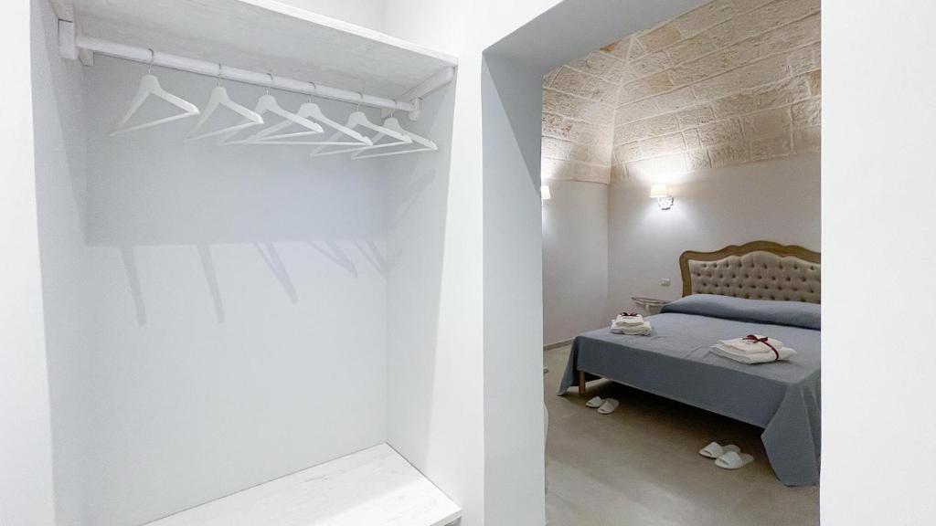 Ліжко або ліжка в номері Palazzo Palasciano