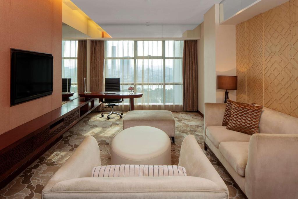 TV a/nebo společenská místnost v ubytování Radisson Blu Hotel Liuzhou
