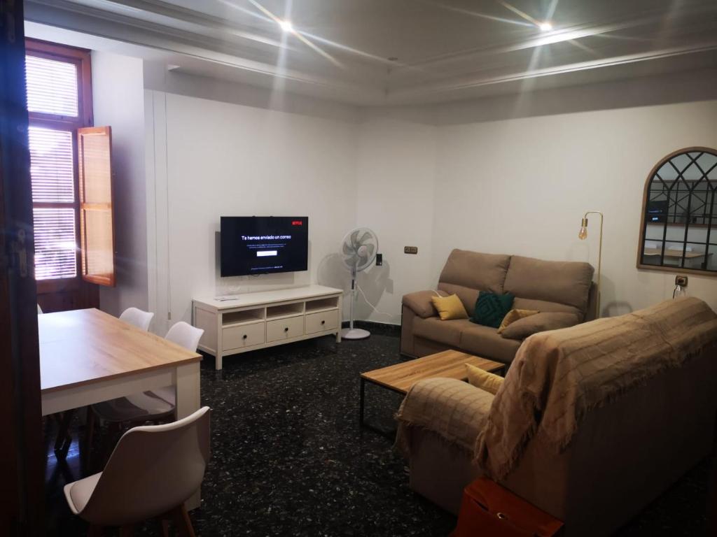 TV a/nebo společenská místnost v ubytování Casa La Lonja de Guadix