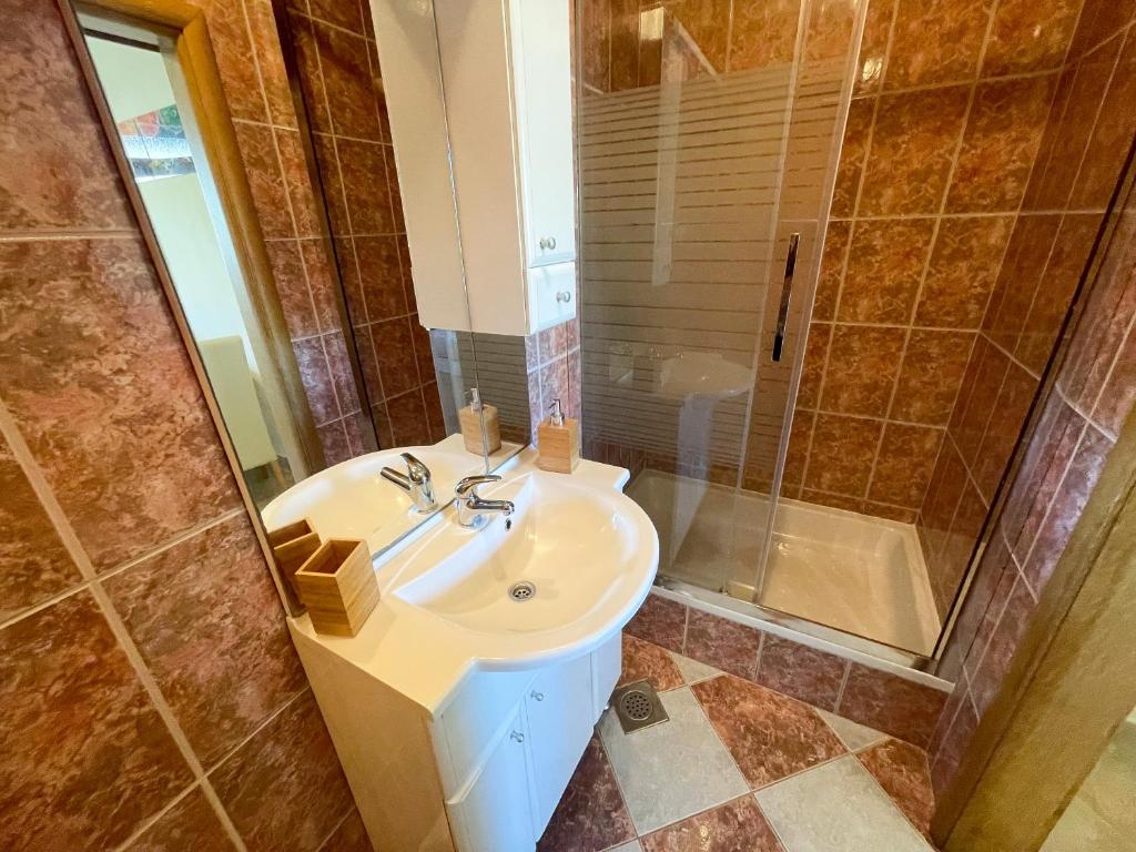 Koupelna v ubytování Apartmani Combaj
