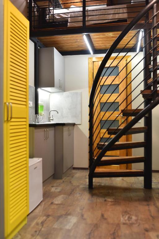 Kuchyň nebo kuchyňský kout v ubytování Mezzanine Hotel
