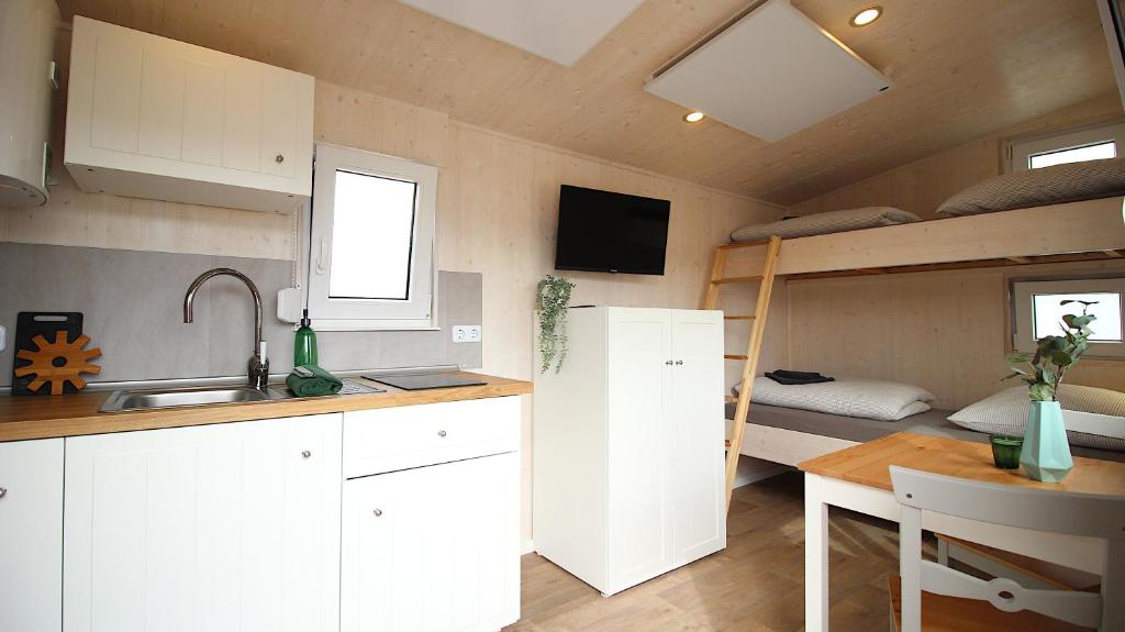 Kuchyň nebo kuchyňský kout v ubytování Tiny Hotel Herdt