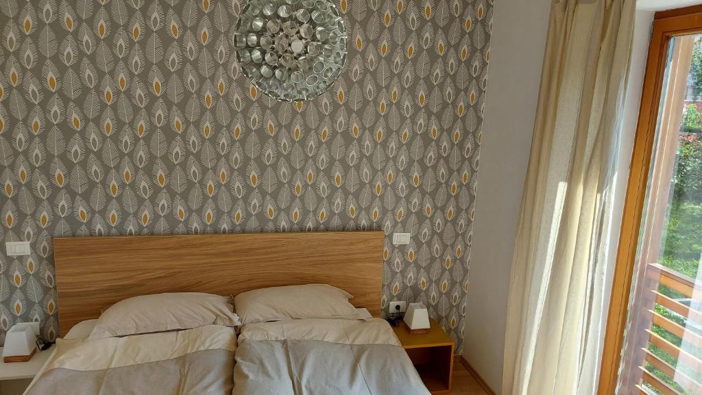 Postel nebo postele na pokoji v ubytování Apartments Supermjau