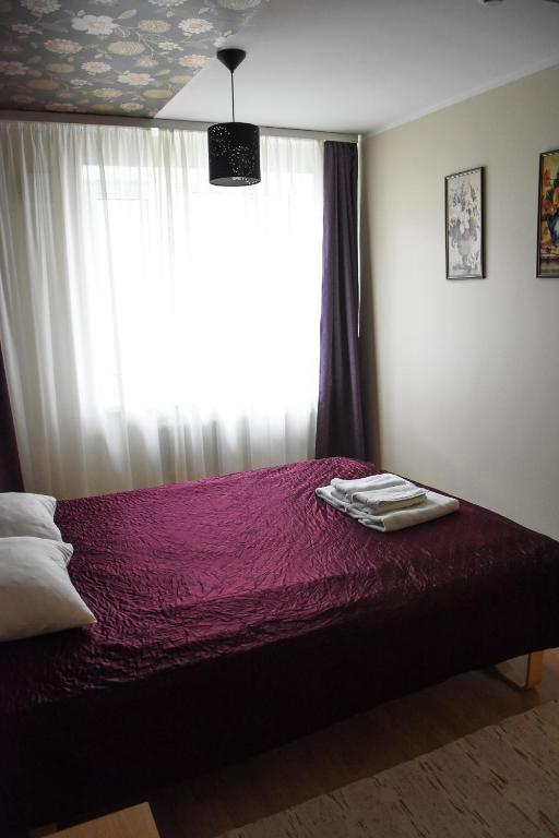 Postel nebo postele na pokoji v ubytování Vao Guesthouse