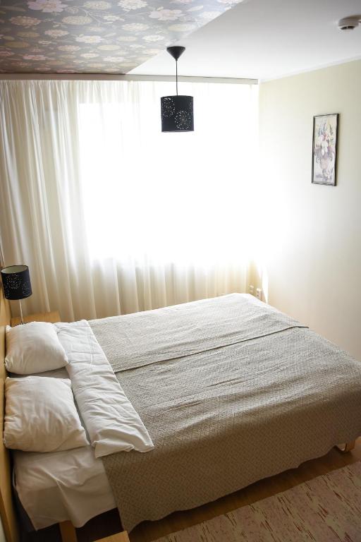 Postel nebo postele na pokoji v ubytování Vao Guesthouse