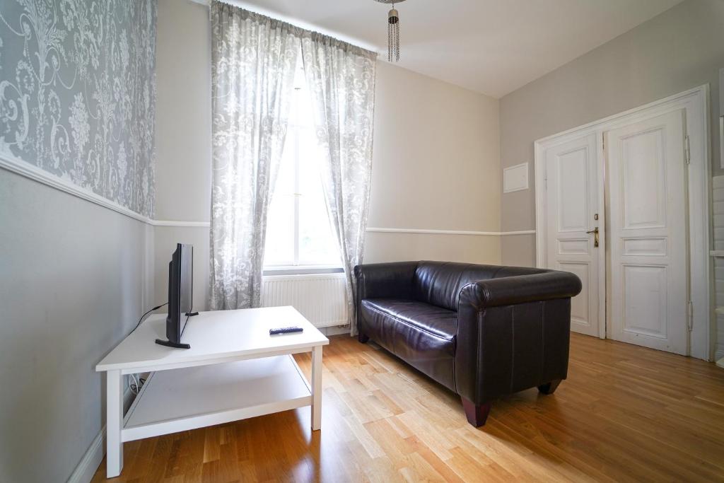 TV a/nebo společenská místnost v ubytování Spa Apartments Theresia