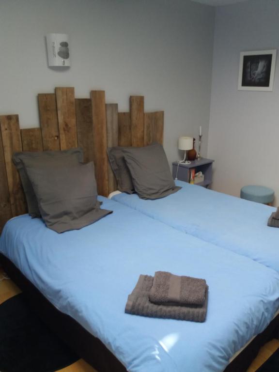 Postel nebo postele na pokoji v ubytování Gîte de Claire