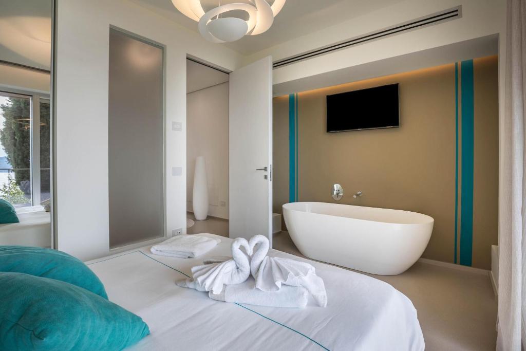 Posteľ alebo postele v izbe v ubytovaní Villa Agave exclusive pool