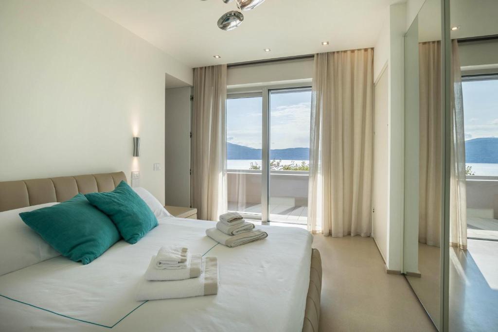 Posteľ alebo postele v izbe v ubytovaní Villa Agave exclusive pool