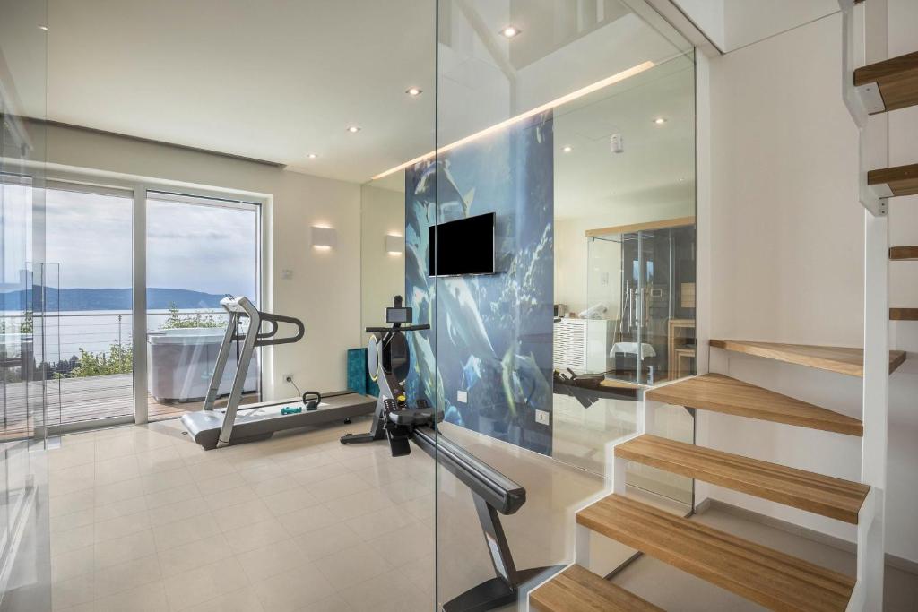 Televízia a/alebo spoločenská miestnosť v ubytovaní Villa Agave exclusive pool