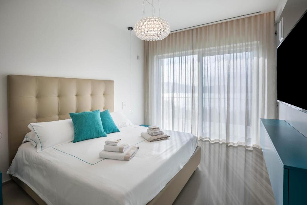 Posteľ alebo postele v izbe v ubytovaní Villa Agave exclusive pool