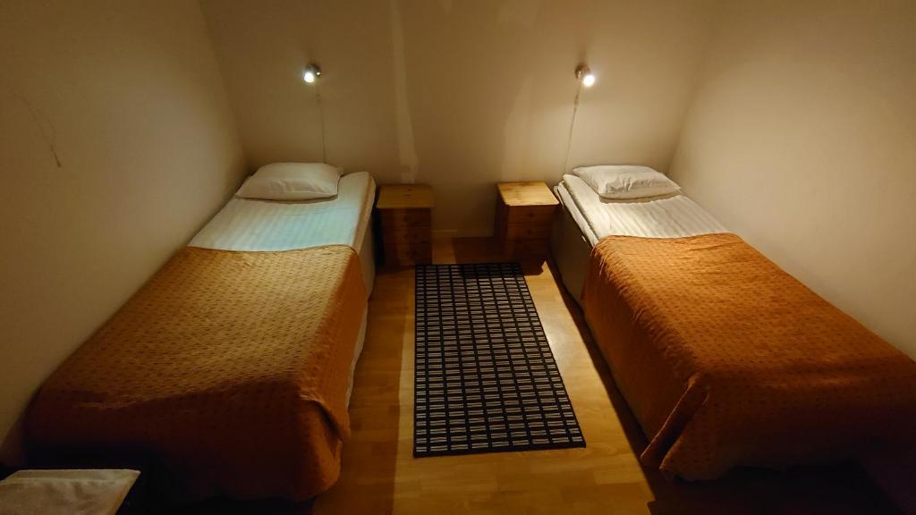 Postel nebo postele na pokoji v ubytování Hotel Guossi