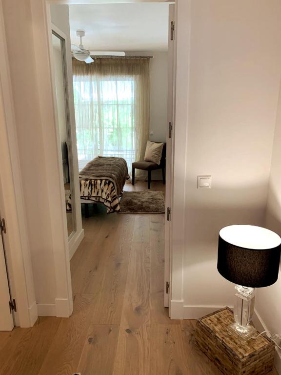 Postel nebo postele na pokoji v ubytování Marbella playa Residencial con piscina