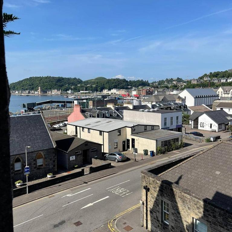 a view of a town with buildings and a street at No7 Oban Harbour in Oban