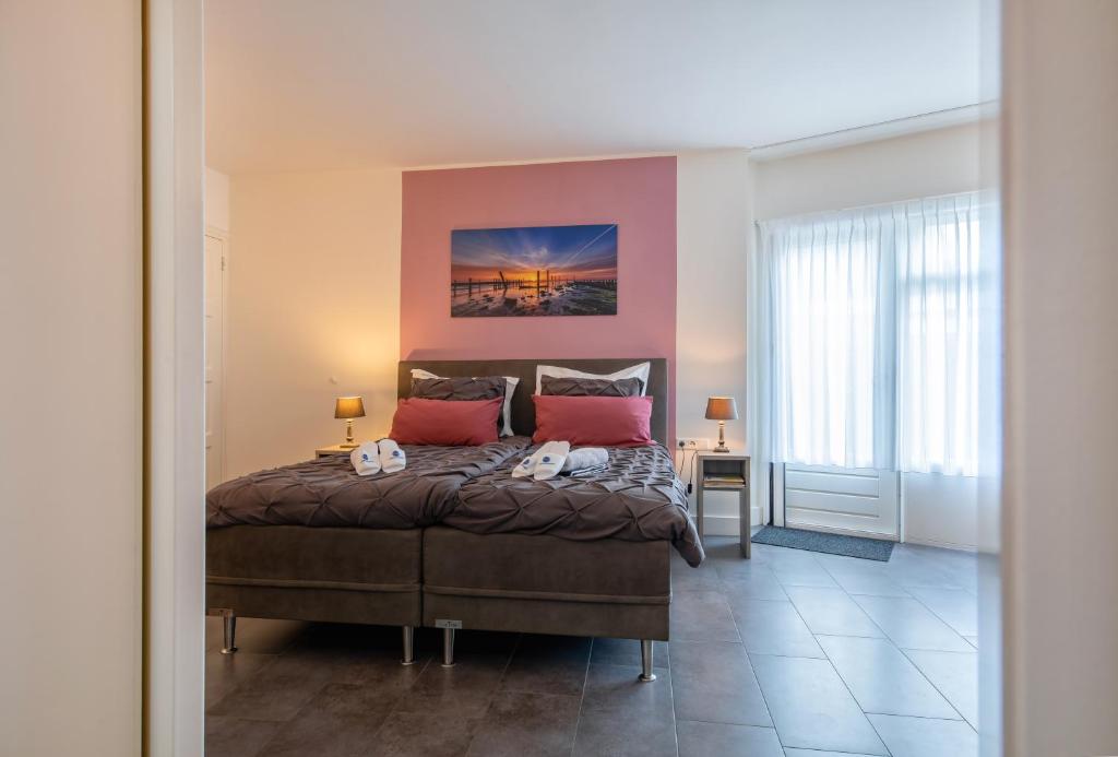 Postel nebo postele na pokoji v ubytování BnB 't Kraaiennest