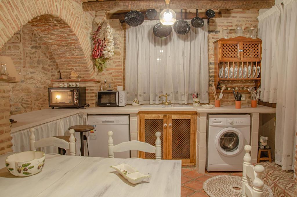 Kuchyňa alebo kuchynka v ubytovaní Casa Rural La CasAna