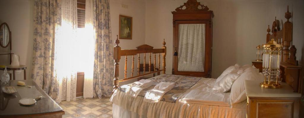 Posteľ alebo postele v izbe v ubytovaní Casa Rural La CasAna