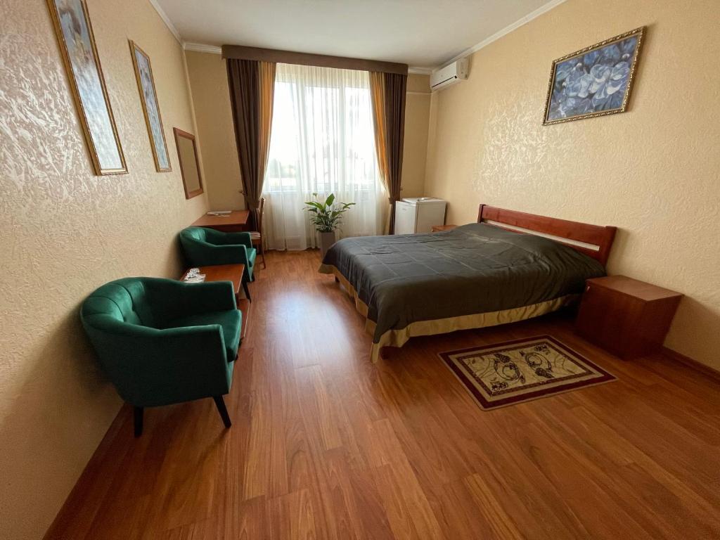 Postel nebo postele na pokoji v ubytování Yunist