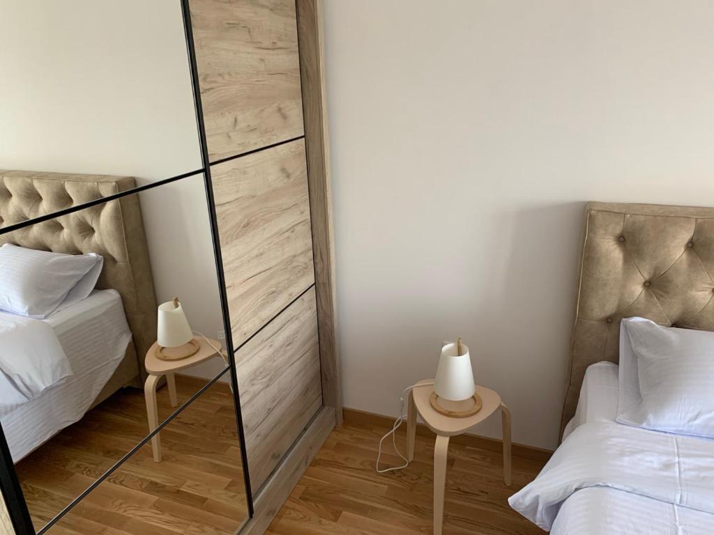Postel nebo postele na pokoji v ubytování Pinnacle MNE