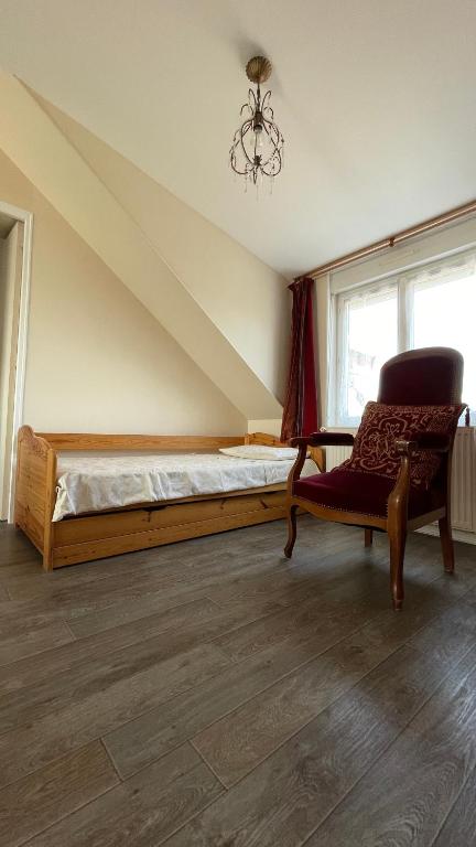 Ein Bett oder Betten in einem Zimmer der Unterkunft Le Grand Chalet