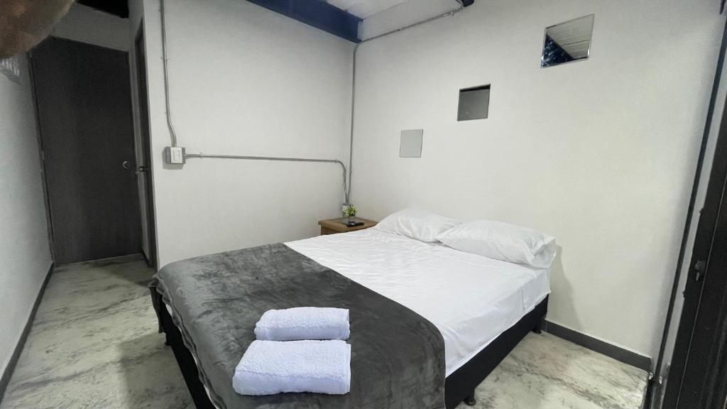 Postel nebo postele na pokoji v ubytování Hotel Casa Malibú